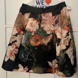 Ted Baker London Black and Floral Skirt. Size 1